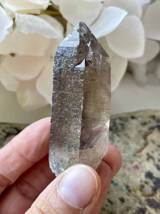 Lemurian smoky quartz with inclusions